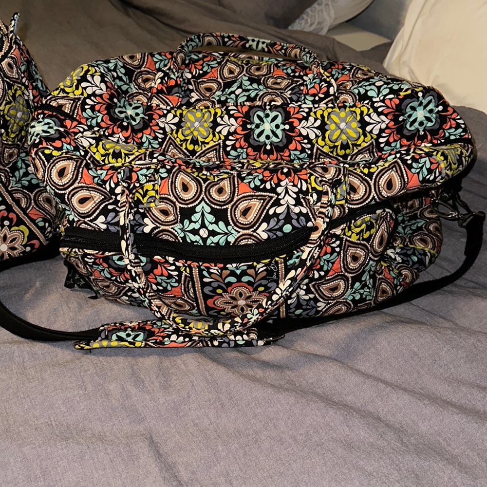 2 vera bradley duffle bags. 1 large and one medium sized